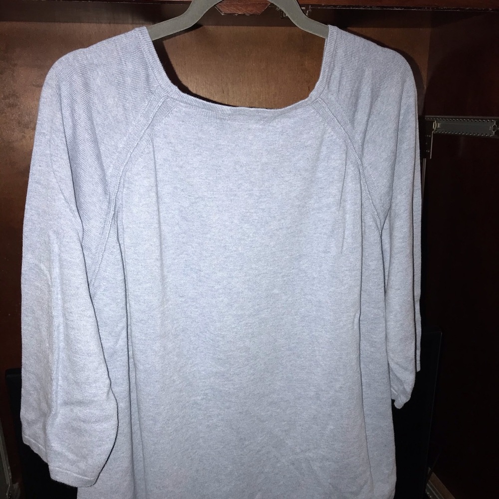 Light blue cotton sweater.